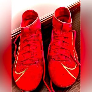 Orange Nike cleats.Size 5.5 youth.